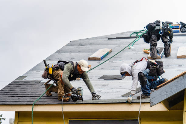 Professional Emergency Roof Repair technician working in East Hampton, NY